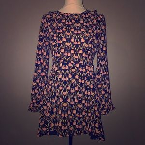Floral print over black dress